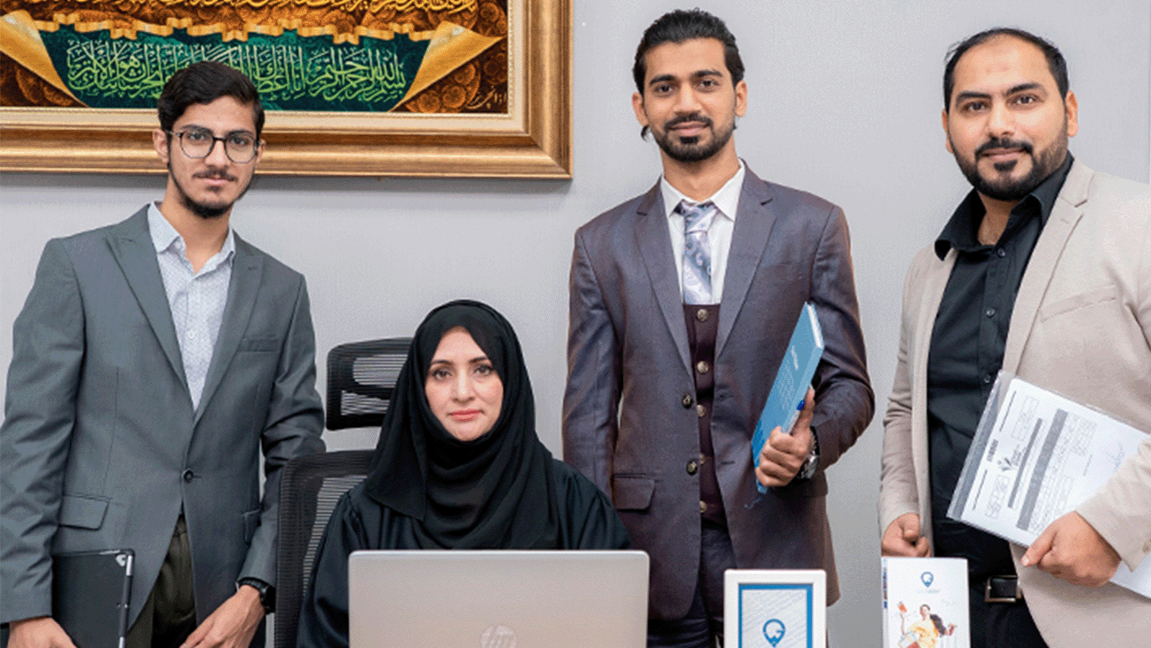 Public Relations Officers Posing Camera in Office