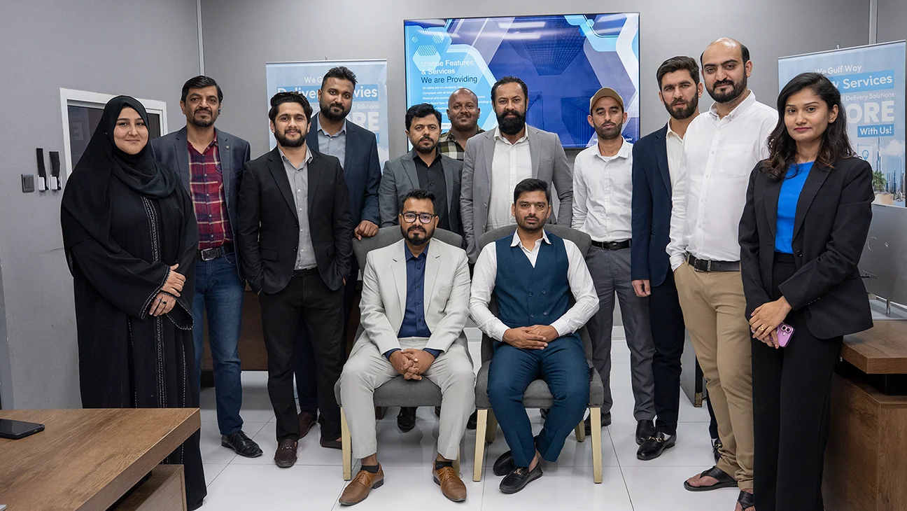 Emirates Way Cargo Team in Office Facing Camera
