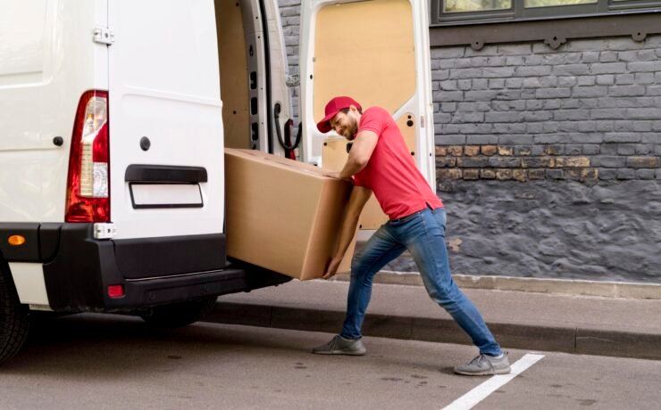 Mover Team Member is Loading Heavy Stuff on Truck