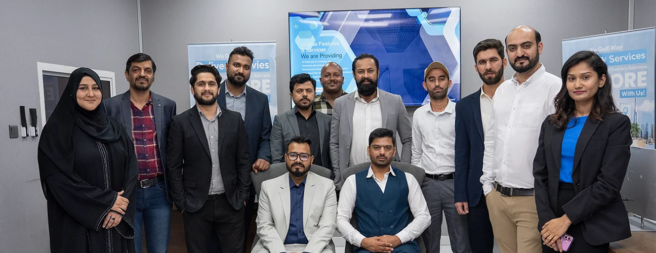 Emirates Way Cargo Team in Office Posing Camera